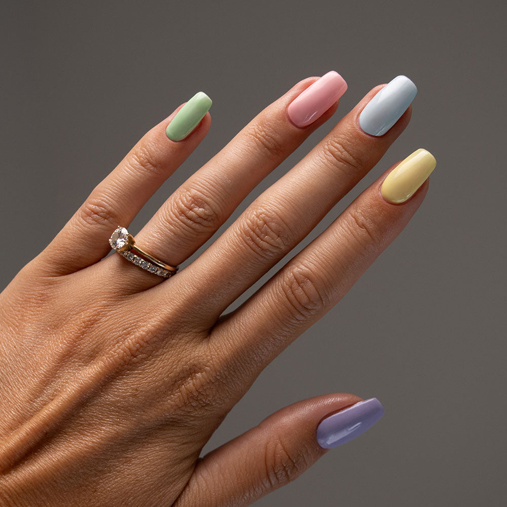 Gelous Strawberry Kisses, Lemon Sorbet, Baby Blues, Mint to Be & Wink My Way gel nail polish - photographed on model in New Zealand