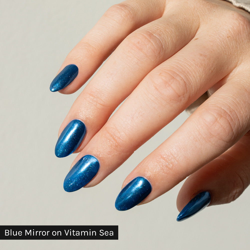 Gelous Blue Mirror Chrome Powder Swatch on Vitamin Sea - photographed in New Zealand on model