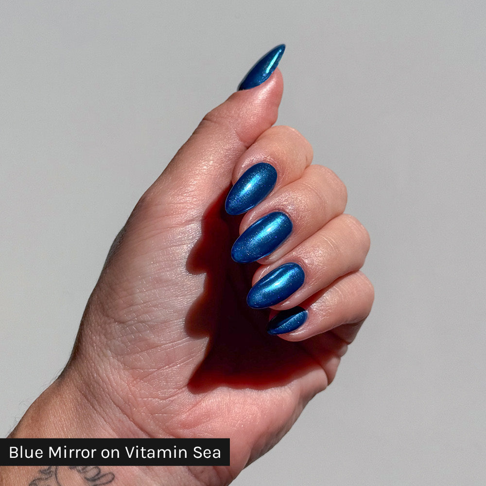 Gelous Blue Mirror Chrome Powder Swatch on Vitamin Sea - photographed in New Zealand on model