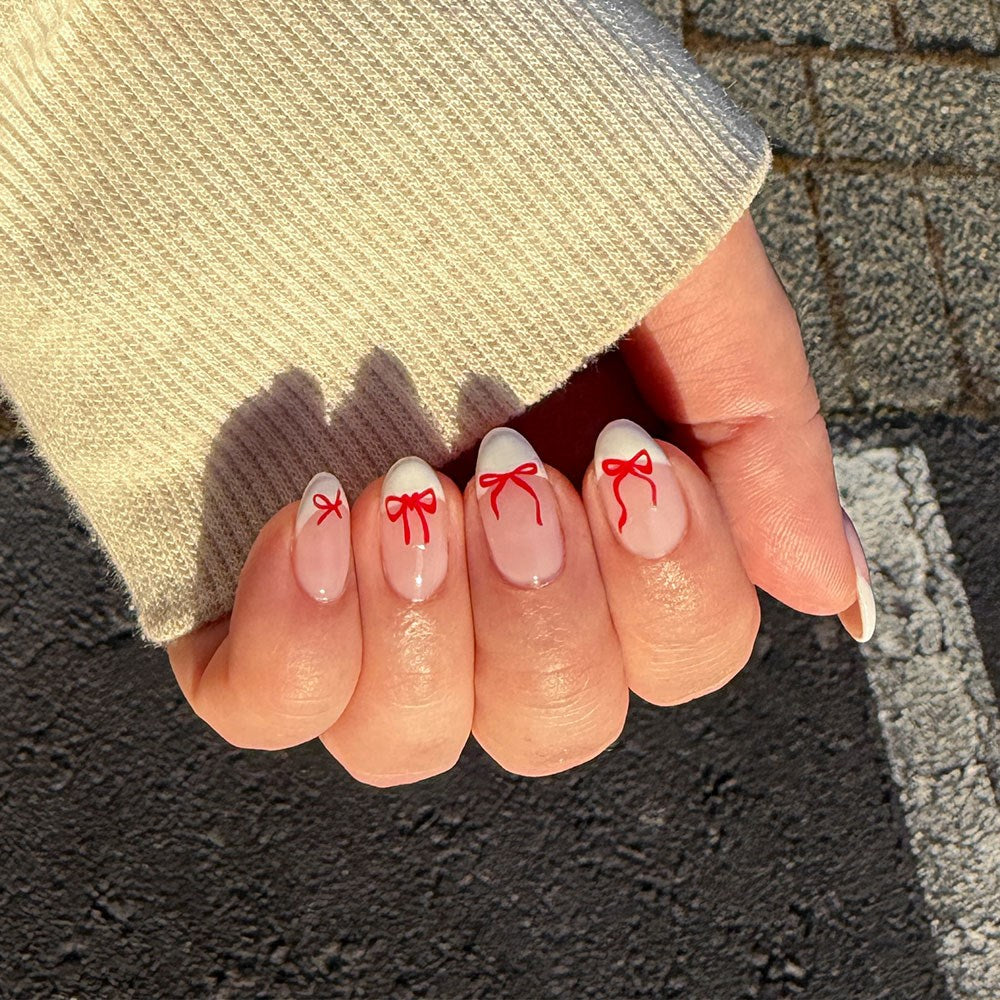 Gelous Red Bows Nail Art Stickers product photo - photographed in New Zealand on model