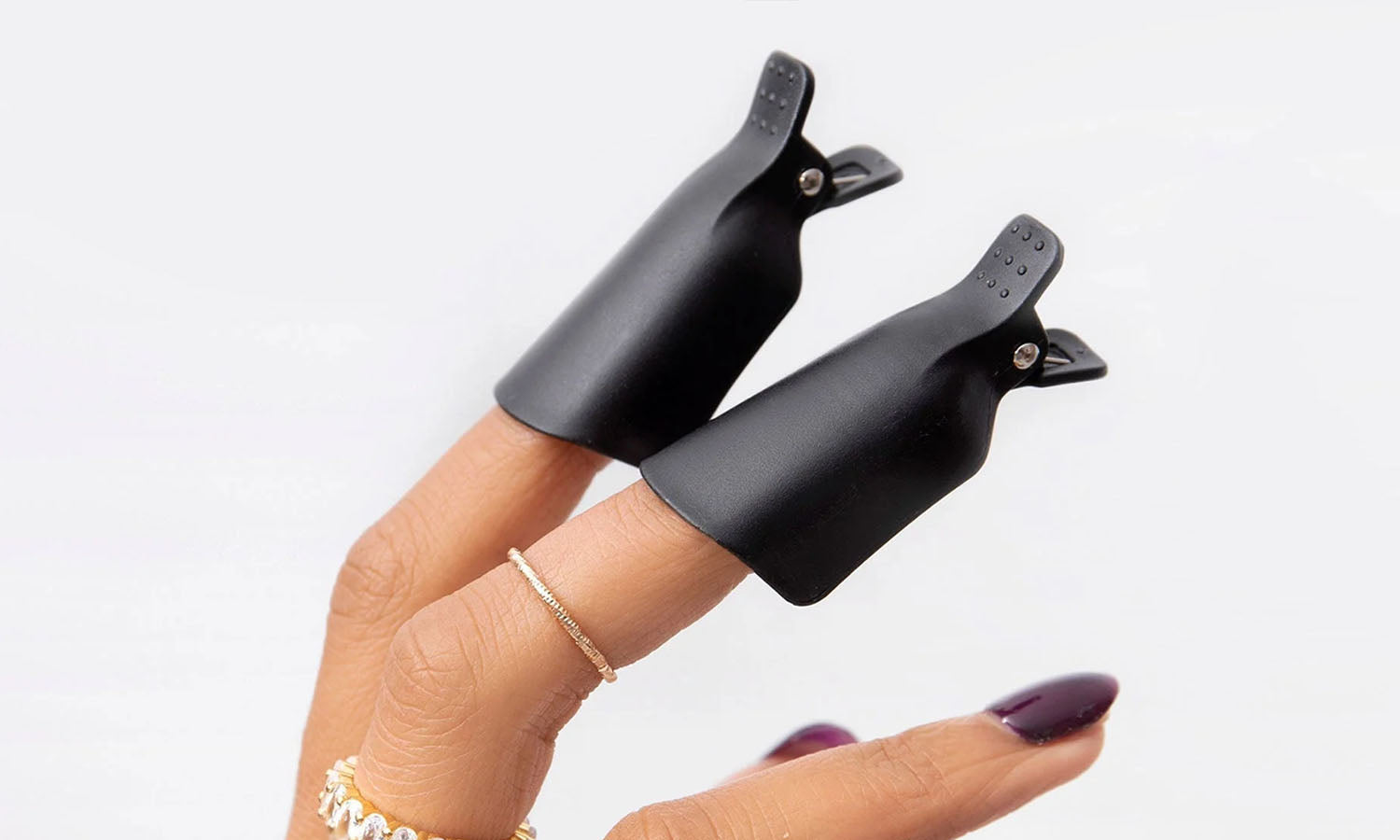 Removing your Gel Nail Polish with Manicure Removal Clips - photographed in New Zealand on model
