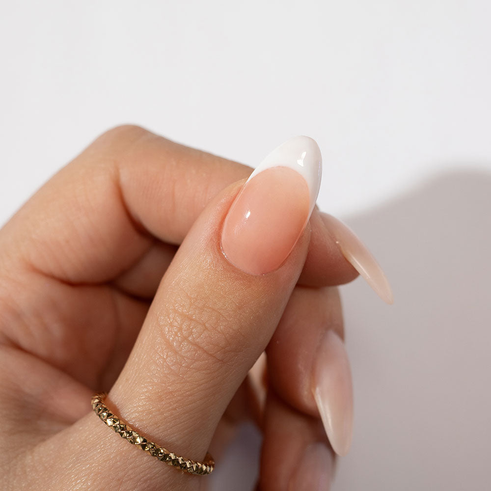 Gelous Peach Builder in a Bottle (BIAB) gel nail polish French tip on model - photographed in New Zealand