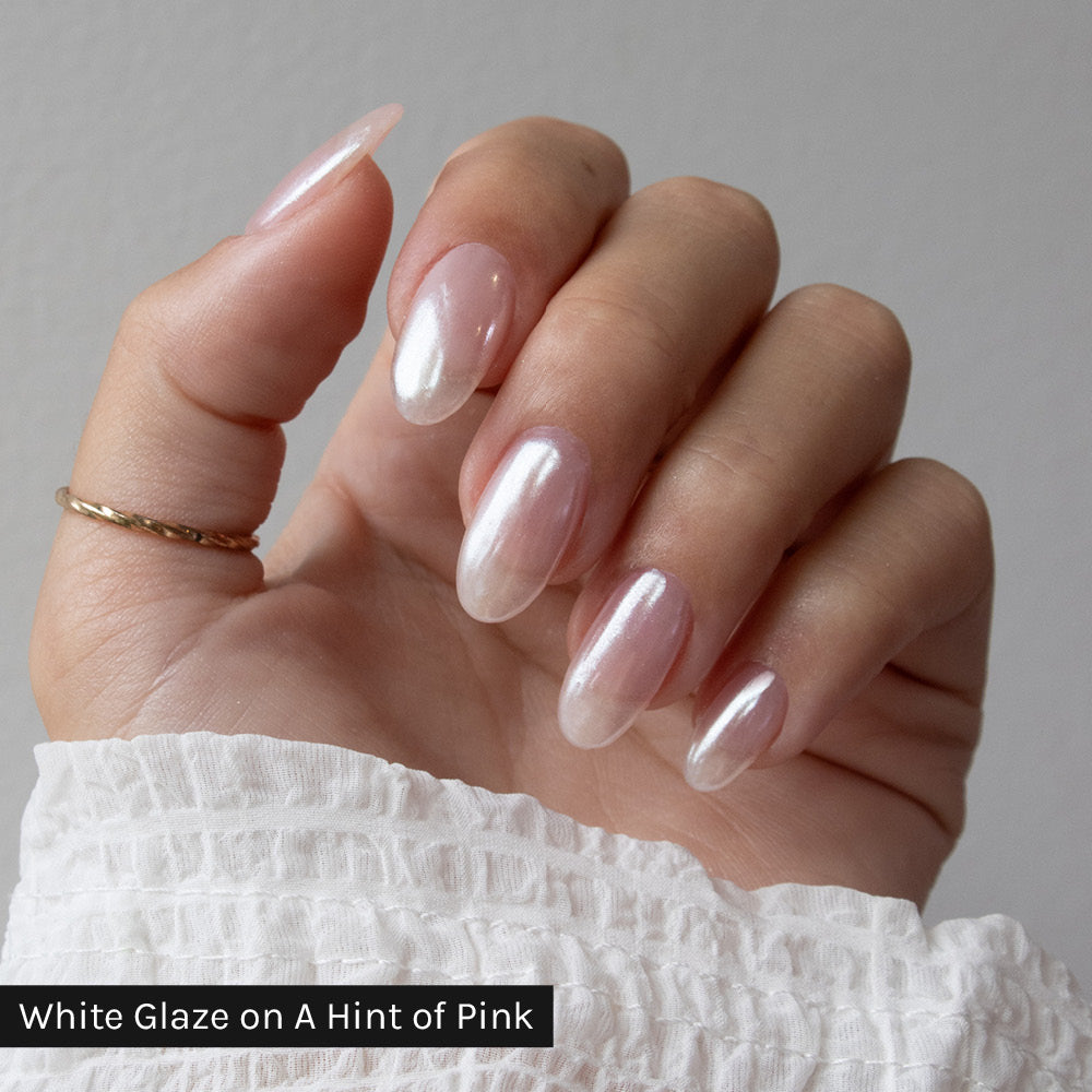Gelous White Glaze Chrome Powder on A Hint of Pink Gel Nail Polish - photographed in New Zealand on model