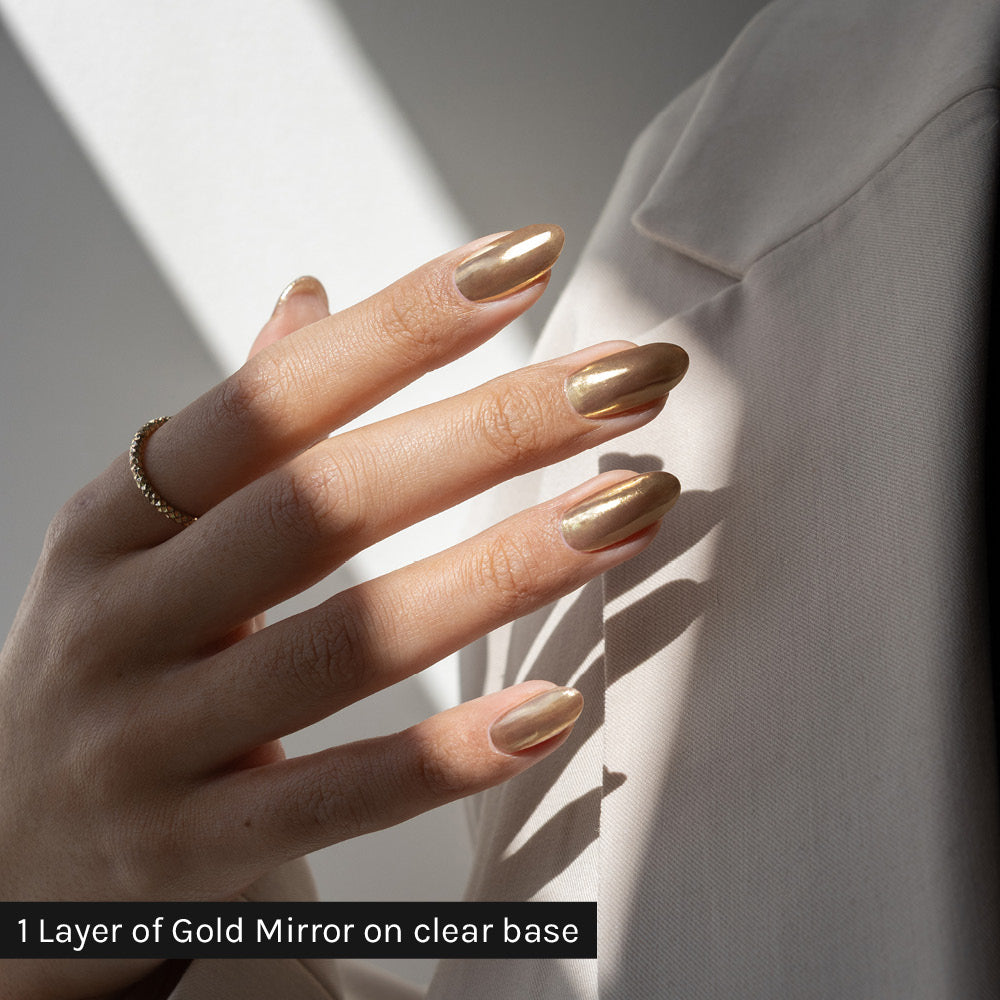 Gelous Gold Mirror Chrome Powder on clear base - photographed in New Zealand on model