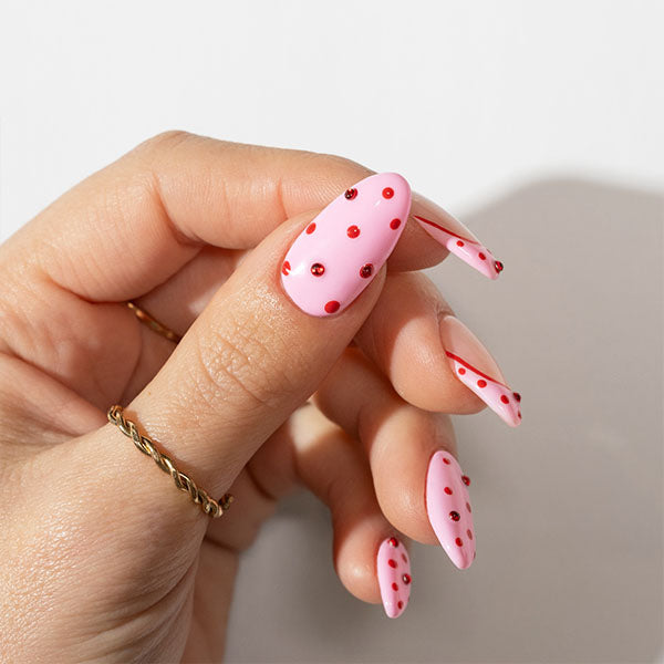 Polka dot and rhinestone gel nail art - photographed in New Zealand on model
