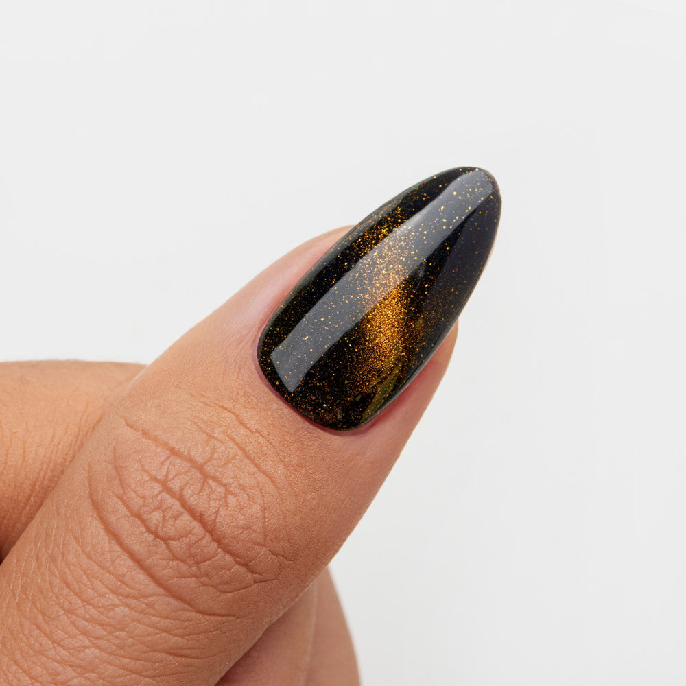 Gelous Fantasy Pearly Gates gel nail polish swatch on Black Out - photographed in New Zealand
