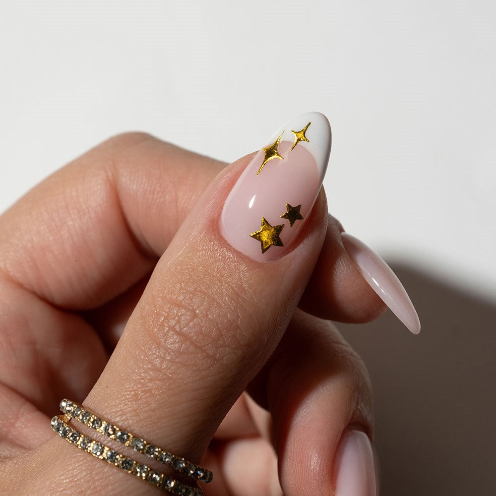 Gelous Gold Star Nail Art Stickers product photo - photographed in New Zealand on model