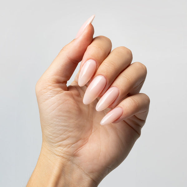 Sheer Pink Nail Tips applied with Clear Rubber Base Coat - photographed in New Zealand on model