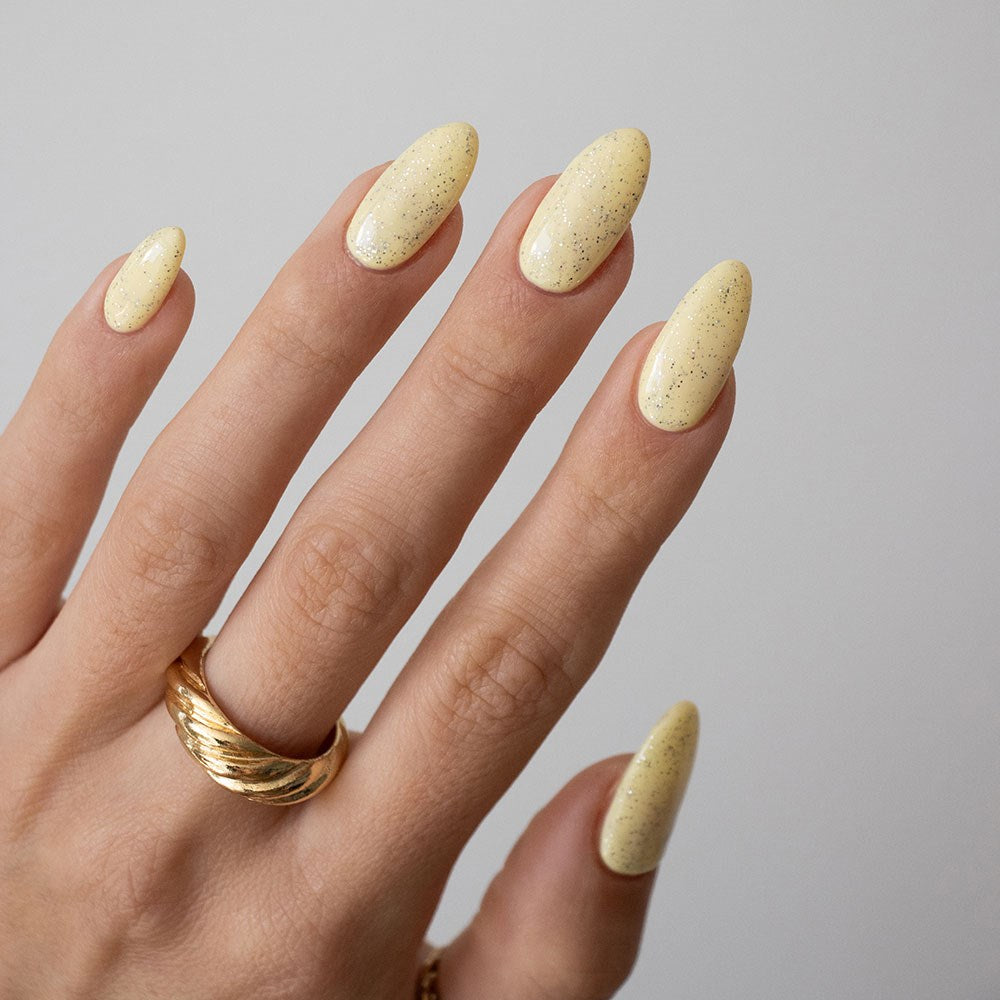 Gelous Fine Glitter Top Coat gel nail polish on model - photographed in New Zealand