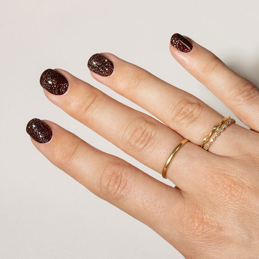 Gelous Fine Glitter Top Coat gel nail polish on model - photographed in New Zealand