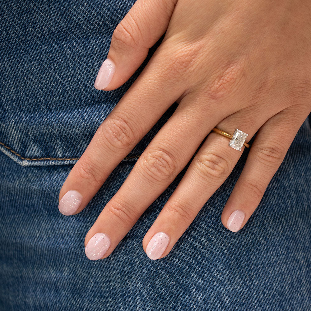 Gelous Fine Glitter Top Coat gel nail polish on model - photographed in New Zealand
