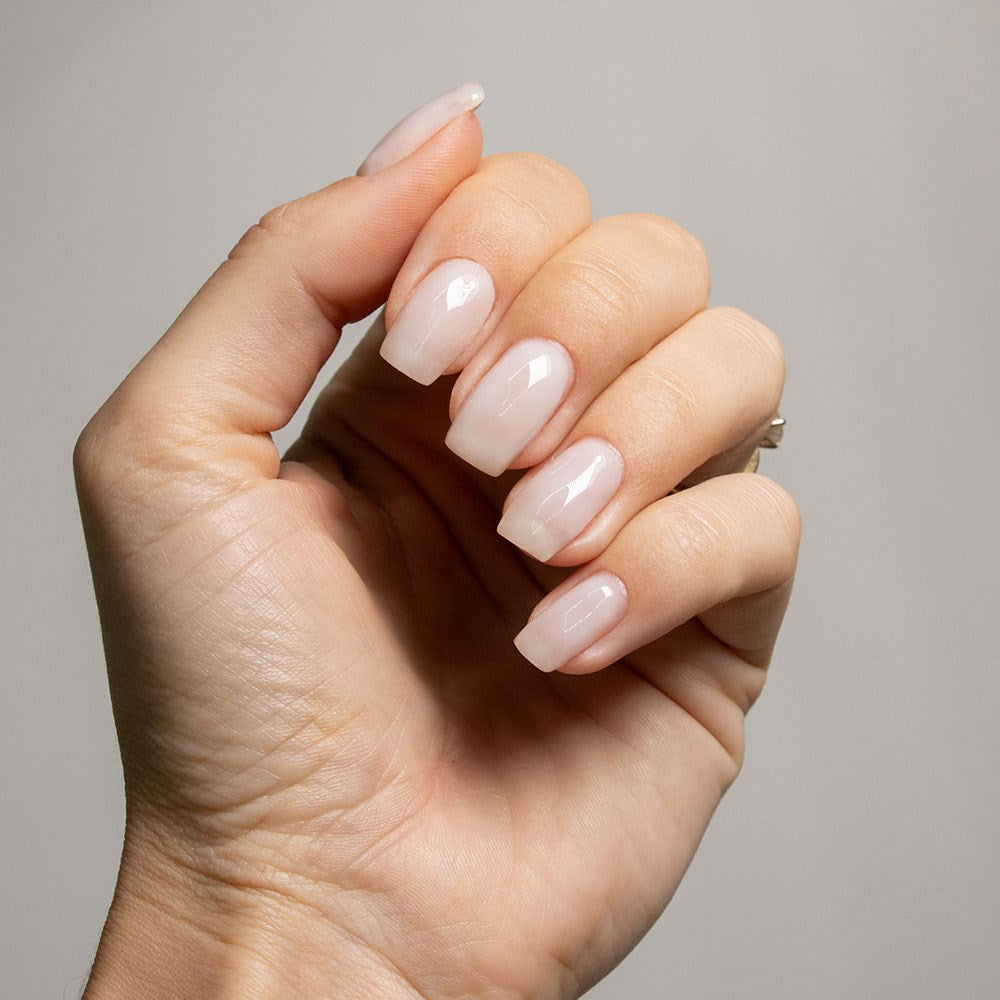Gelous Milky Top Coat gel nail polish on model - photographed in New Zealand