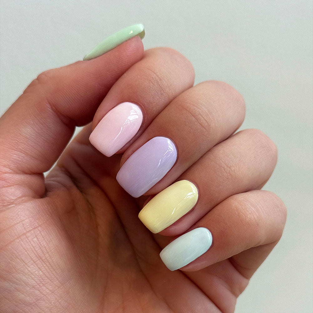 Gelous Milky Top Coat gel nail polish on model - photographed in New Zealand