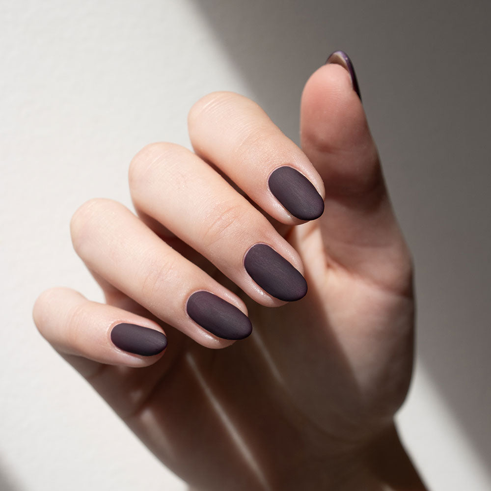 Gelous Matte Top Coat on Vampy Purple gel nail polish - photographed in New Zealand on model
